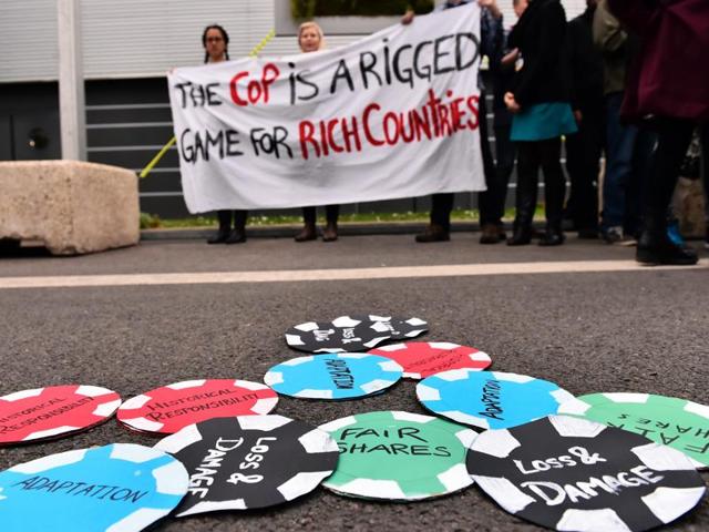 Members of NGO ‘Friends of the Earth’ demonstrate during the United Nations conference on climate change COP21, at Le Bourget, on the outskirts of French capital Paris. The world’s richest 10% contribute 50% carbon emissions, according to a study by Oxfam.(AFP Photo) Members of NGO ‘Friends of the Earth’ demonstrate during the United Nations conference on climate change COP21, at Le Bourget, on the outskirts of French capital Paris. The world’s richest 10% contribute 50% carbon emissions, according to a study by Oxfam.(AFP Photo)