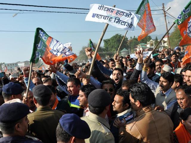BJP activists try to cross barricades at the Vidhan Sabha during the ‘Virbhadra Hatao Pradesh Bachao’ protest rally at Zorawar stadium near Dharamsala on Wednesday. (Shyam Sharma/HT Photo) BJP activists try to cross barricades at the Vidhan Sabha during the ‘Virbhadra Hatao Pradesh Bachao’ protest rally at Zorawar stadium near Dharamsala on Wednesday. (Shyam Sharma/HT Photo)