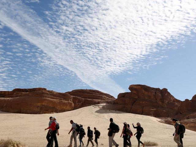 The NGO aims to challenge mainstream perceptions of the area by encouraging Nile Valley residents to explore the untamed wilderness with the Bedouin tribes. Hikers walk in the Wadi Hudra area in South Sinai, Egypt, November 21, 2015.   (REUTERS) 