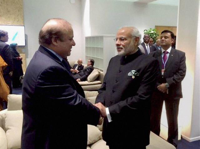 In this file photo, Prime Minister Narendra Modi is seen shaking hands with his Pakistani counterpart Nawaz Sharif in Paris on the sidelines of CoP 21 summit on climate change on Monday. (PTI File Photo) In this file photo, Prime Minister Narendra Modi is seen shaking hands with his Pakistani counterpart Nawaz Sharif in Paris on the sidelines of CoP 21 summit on climate change on Monday. (PTI File Photo)