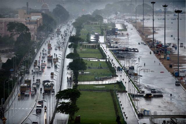 The Marina beach on the Bay of Bengal coast is partly covered with rainwater. (PTI) The Marina beach on the Bay of Bengal coast is partly covered with rainwater. (PTI)