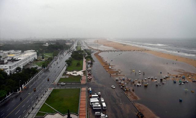 A view the Marina Beach during heavy downpour in Chennai. (PTI) A view the Marina Beach during heavy downpour in Chennai. (PTI)
