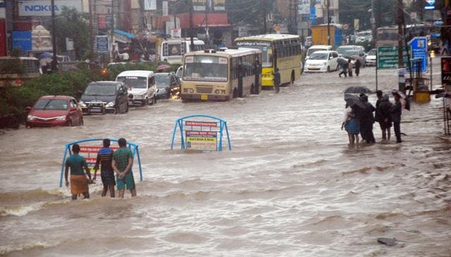 A flooded road in Chennai. Residents in Chennai are offering support to the rain-hit people through the hashtag #ChennaiRainsHelp. (HT Photo) A flooded road in Chennai. Residents in Chennai are offering support to the rain-hit people through the hashtag #ChennaiRainsHelp. (HT Photo)