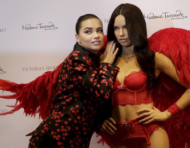 <p>Victoria's Secret model Adriana Lima comes face to face with her body double.</p><p>Lima's wax figure was unveiled at Madame Tussauds in New York.</p><p>Dressed in devilishly red lingerie and adorned with red feathered wings, the Victoria's Secret Angel appeared pleased with her body of work. Lima is the first Victoria's Secret Angel to be sculpted in wax by Madame Tussauds and only the second Brazilian.</p><p>Picture perfect! You can get close to Lima's uplifting wax figure at Madame Tussauds in New York's Times Square.</p>