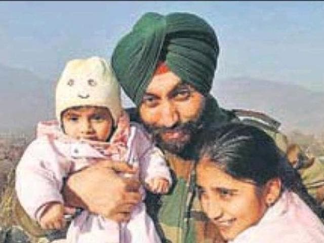 Lt Col Karanbir Singh Natt with his family. (HT Photo) Lt Col Karanbir Singh Natt with his family. (HT Photo)