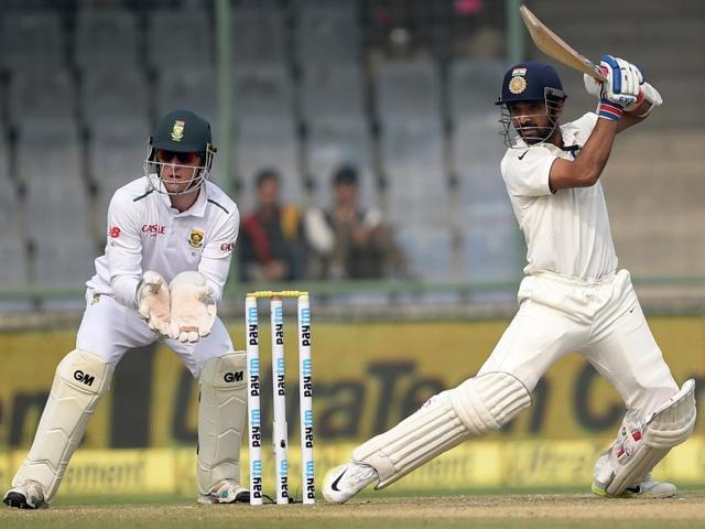 Ajinkya Rahane plays a shot as South Africa keeper Dane Vilas watches. (AFP Photo)