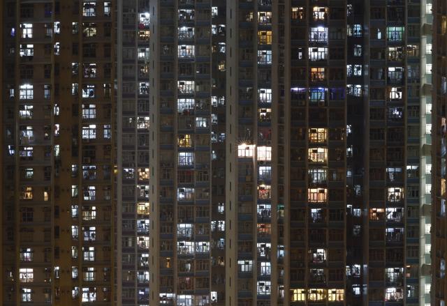 In this Dec. 1, 2015 photo, an apartment building is seen in Hong Kong where both the living and the dead compete for space in the densely populated southern Chinese city. (AP) In this Dec. 1, 2015 photo, an apartment building is seen in Hong Kong where both the living and the dead compete for space in the densely populated southern Chinese city. (AP)