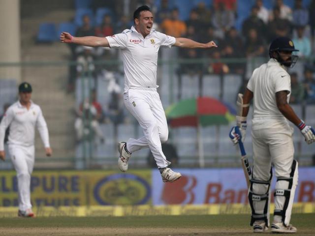 Kyle Abbott jumps in celebration after dismissing Murali Vijay, right. The wicket was disallowed as Abbott had bowled a no-ball. (AP Photo)