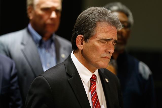 Mayor of San Bernadino R Carey Davis pauses during a press conference at City Hall, following the shooting that took place inside the Inland Regional Center. (AFP Photo)
