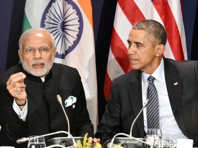 US President Barack Obama met PM Modi in Paris on the sidelines of the United Nation’s climate change summit on Monday, their sixth meeting since last September.(AP FIle)