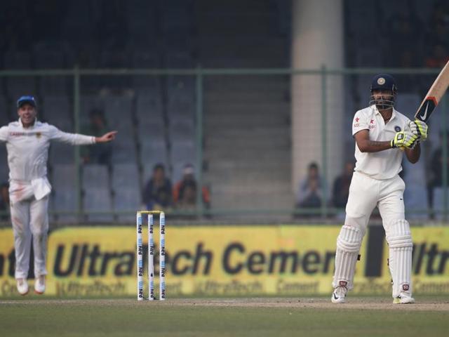 India’s Ravindra Jadeja, right, watches his catch being taken by South Africa’s Dean Elgar as AB de Villiers jumps up in celebration. (AP Photo)