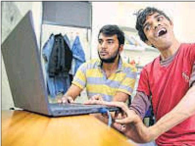 Harshit Kudeshiya (right) with his classmate Hitesh Singh work on a project at MNIT in Jaipur on Wednesday.(Himanshu Vyas/HT Photo) Harshit Kudeshiya (right) with his classmate Hitesh Singh work on a project at MNIT in Jaipur on Wednesday.(Himanshu Vyas/HT Photo)