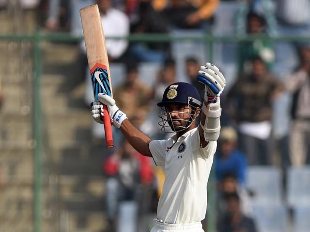 India's Ajinkya Rahane raises his bat after completing a century during the second day of the fourth Test match between India and South Africa at the Feroz Shah Kotla Stadium in New Delhi on December 4, 2015. (AFP Photo) India's Ajinkya Rahane raises his bat after completing a century during the second day of the fourth Test match between India and South Africa at the Feroz Shah Kotla Stadium in New Delhi on December 4, 2015. (AFP Photo)