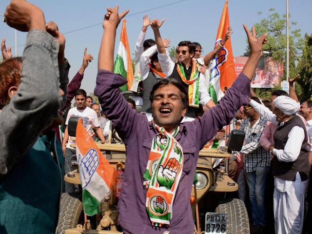 Congress candidates celebrate their victory in Municipal elections along with their supporters in Ahmedabad on Wednesday.(PTI)