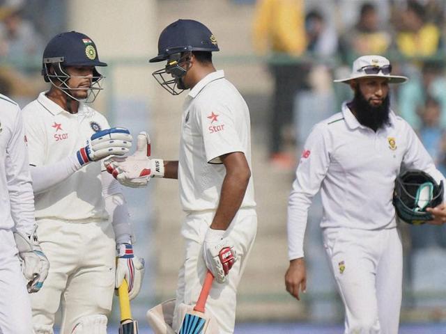 India's Ravichandran Ashwin celebrates his half century with Umesh Yadav. (PTI Photo) India's Ravichandran Ashwin celebrates his half century with Umesh Yadav. (PTI Photo)