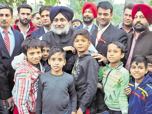 Punjab deputy chief minister Sukhbir Singh Badal posing with children during his visit to Company Bagh in Jalandhar on Friday. (HT Photo) Punjab deputy chief minister Sukhbir Singh Badal posing with children during his visit to Company Bagh in Jalandhar on Friday. (HT Photo)