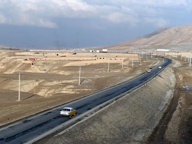 Afghan local vehicles travel on the highway to Maidan Wardak province west of Kabul. Drivers say the country's ethnic Hazara minority are slaughtered by militants "like sheep and cows" while travelling through the ‘Death Road’. (AFP Photo) Afghan local vehicles travel on the highway to Maidan Wardak province west of Kabul. Drivers say the country's ethnic Hazara minority are slaughtered by militants "like sheep and cows" while travelling through the ‘Death Road’. (AFP Photo)