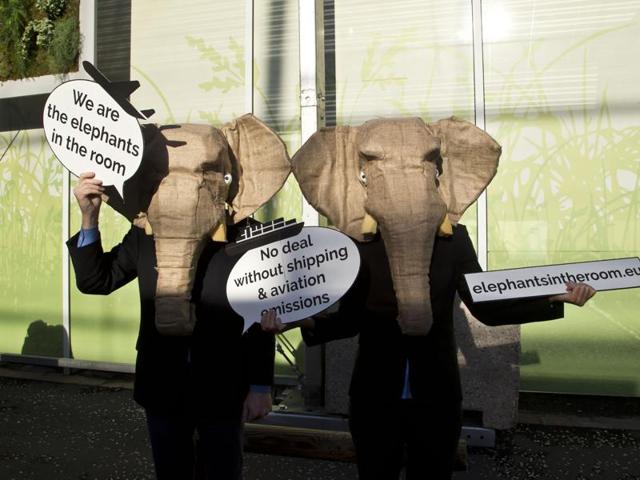 Representatives of NGOs wear elephant masks and hold banner at the COP21, United Nations Climate Change Conference, in Le Bourget north of Paris.(AP) Representatives of NGOs wear elephant masks and hold banner at the COP21, United Nations Climate Change Conference, in Le Bourget north of Paris.(AP)