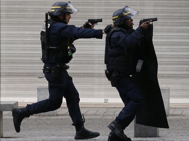 Members of the Raid, a special intervention unit of the French police during a raid in northern suburb of Paris. The Guardian reported on Saturday that the attackers met extremists earlier in UK. (AFP File Photo) Members of the Raid, a special intervention unit of the French police during a raid in northern suburb of Paris. The Guardian reported on Saturday that the attackers met extremists earlier in UK. (AFP File Photo)