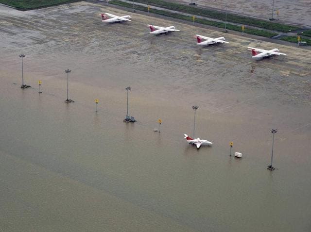 An aerial view of the submerged Chennai airport during heavy rains in Chennai on December 2. Technical flights have been resumed at the airport, but commercial flying is still on hold due to waterlogging.(PTI Photo)