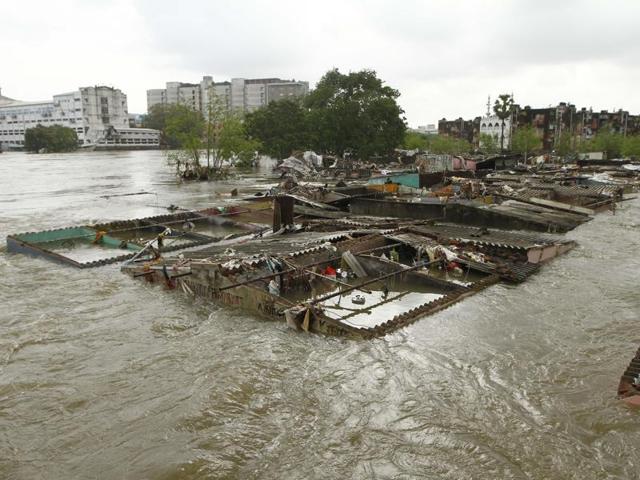 Houses submerged in flood waters, in Chennai. The heaviest rainfall in more than 100 years devastated swathes of the state of Tamil Nadu. (AP Photo) Houses submerged in flood waters, in Chennai. The heaviest rainfall in more than 100 years devastated swathes of the state of Tamil Nadu. (AP Photo)