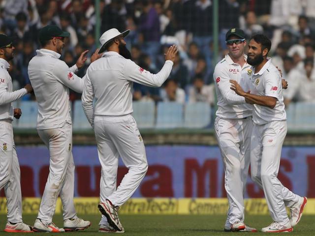 South African bowler Imran Tahir, right, celebrates the dismissal of Cheteshwar Pujara with teammates, from left, Jean-Paul Duminy, Faf du Plessis, Hashim Amla, and AB de Villiers. (AP photo) South African bowler Imran Tahir, right, celebrates the dismissal of Cheteshwar Pujara with teammates, from left, Jean-Paul Duminy, Faf du Plessis, Hashim Amla, and AB de Villiers. (AP photo)
