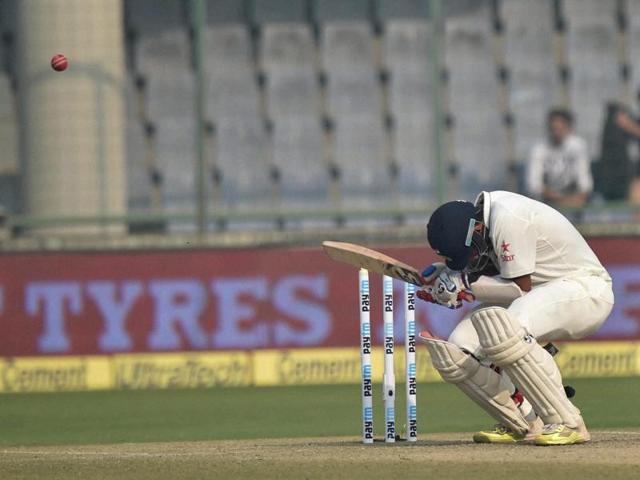India's Cheteshwar Pujara ducks a bouncer. (PTI photo) India's Cheteshwar Pujara ducks a bouncer. (PTI photo)