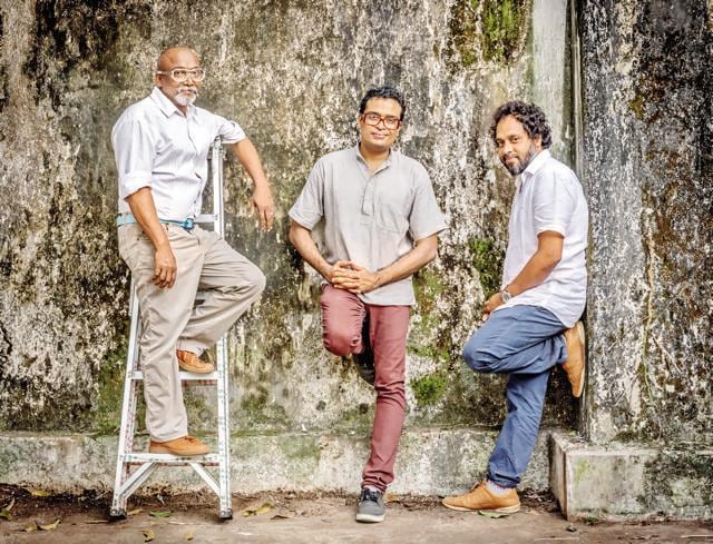 Kochi-Muziris biennale: Bose Krishnamchari (left) and Riyas Komu, the founders and curators of India’s first ever biennale, launched in 2012, flank Jitish Kallat (centre) the curator for the 2014 edition. In its second innings, the biennale featured 94 artists from 30 countries. One of the central themes for the biennale was Kochi’s connection to the maritime chapter of the age of discovery from the 14th to 17th century AD. (Photo courtesy: The Kochi Biennale Foundation) Kochi-Muziris biennale: Bose Krishnamchari (left) and Riyas Komu, the founders and curators of India’s first ever biennale, launched in 2012, flank Jitish Kallat (centre) the curator for the 2014 edition. In its second innings, the biennale featured 94 artists from 30 countries. One of the central themes for the biennale was Kochi’s connection to the maritime chapter of the age of discovery from the 14th to 17th century AD. (Photo courtesy: The Kochi Biennale Foundation)
