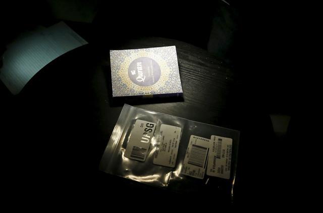 A copy of the Quran and a plastic delivery envelope are shown inside the home of suspects Syed Rizwan Farook and Tashfeen Malik in Redlands, California. (REUTERS) A copy of the Quran and a plastic delivery envelope are shown inside the home of suspects Syed Rizwan Farook and Tashfeen Malik in Redlands, California. (REUTERS)