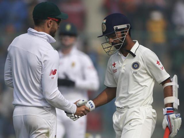 South Africa’s Faf du Plessis, left, shakes hands with Ajinkya Rahane after Rahane scored his second century of the match. (AP) South Africa’s Faf du Plessis, left, shakes hands with Ajinkya Rahane after Rahane scored his second century of the match. (AP)