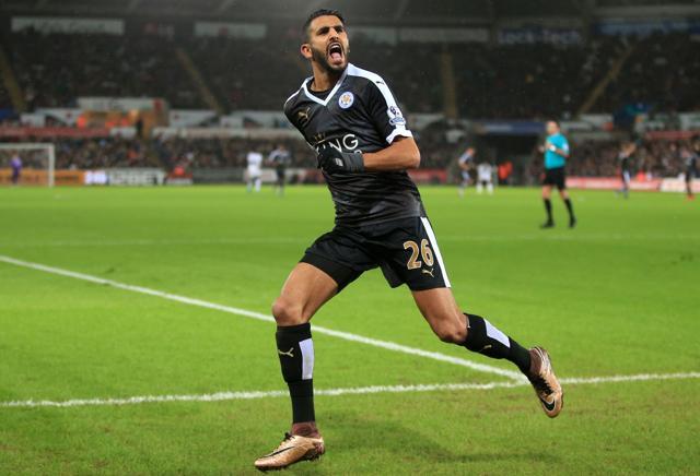 Riyad Mahrez celebrates after scoring Leicester City’s third against Swansea City. (AP Photo)