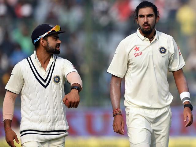 India's captain Virat Kohli (L) talks to pacer Ishant Sharma. (AFP Photo) India's captain Virat Kohli (L) talks to pacer Ishant Sharma. (AFP Photo)