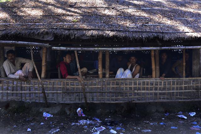 Bangladeshi climate refugees sit in a restaurant in Cox's Bazar, where some climate refugees from Kutbudia Island have been resettled. (AFP) Bangladeshi climate refugees sit in a restaurant in Cox's Bazar, where some climate refugees from Kutbudia Island have been resettled. (AFP)