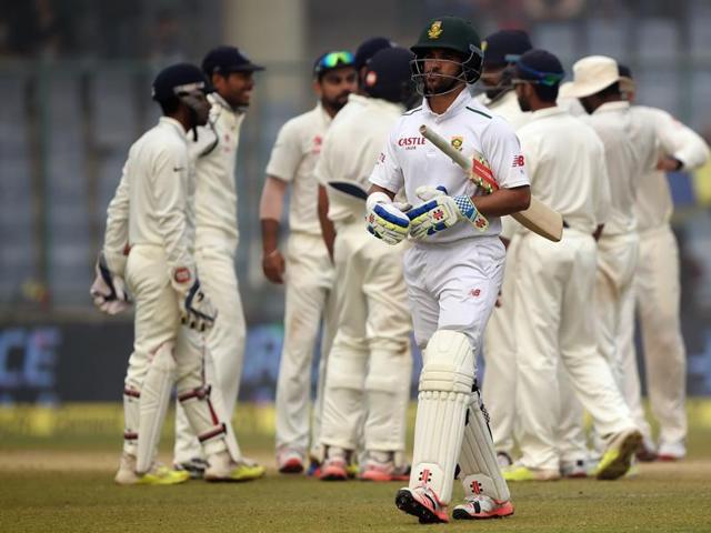South Africa's JP Duminy walks back as the Indian team celebrates his dismissal by Ravichandran Ashwin. (AFP Photo) South Africa's JP Duminy walks back as the Indian team celebrates his dismissal by Ravichandran Ashwin. (AFP Photo)