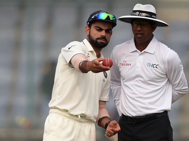 Virat Kohli has the ball inspected by the umpire Kumar Dharmasena. (AFP Photo) Virat Kohli has the ball inspected by the umpire Kumar Dharmasena. (AFP Photo)