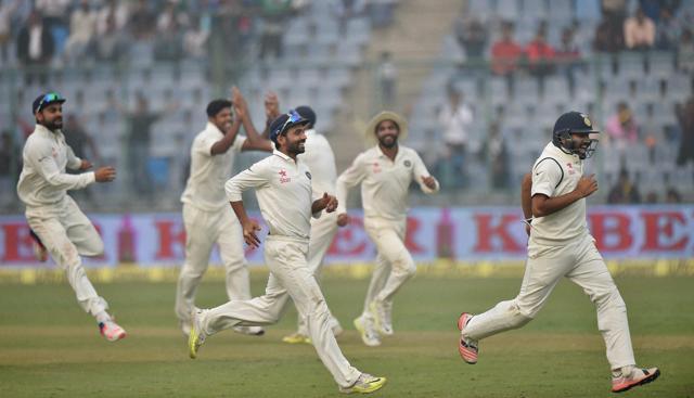 Indian players celebrate the dismissal of Dane Vilas of South Africa during final day of the fourth Test match at Feroz Shah Kotla Stadium in New Delhi on Monday. (PTI) Indian players celebrate the dismissal of Dane Vilas of South Africa during final day of the fourth Test match at Feroz Shah Kotla Stadium in New Delhi on Monday. (PTI)
