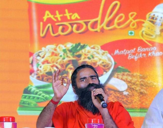 New Delhi, India - November 16, 2015: Baba Ramdev launching Patanjali Atta Noodles, in New Delhi on Monday, 16 November 2015. (Photo by Vipin Kumar/Hindustan Times) (Hindustan Times) New Delhi, India - November 16, 2015: Baba Ramdev launching Patanjali Atta Noodles, in New Delhi on Monday, 16 November 2015. (Photo by Vipin Kumar/Hindustan Times) (Hindustan Times)