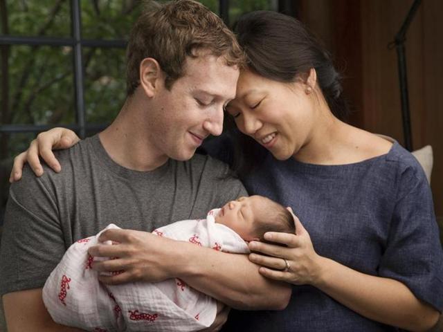 Max Chan Zuckerberg is held by her parents, Mark Zuckerberg and Priscilla Chan Zuckerberg. Facebook CEO Zuckerberg and his wife have announced the birth of their daughter, Max, as well as plans to donate most of their wealth to a new organization that will tackle a broad range of the world’s ills.(AP)