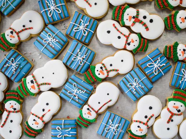 Biscuits shaped and iced in the form of snowmen and presents wait to be packaged at the Biscuiteers biscuit company in south London on December 8, 2015. (AFP) Biscuits shaped and iced in the form of snowmen and presents wait to be packaged at the Biscuiteers biscuit company in south London on December 8, 2015. (AFP)