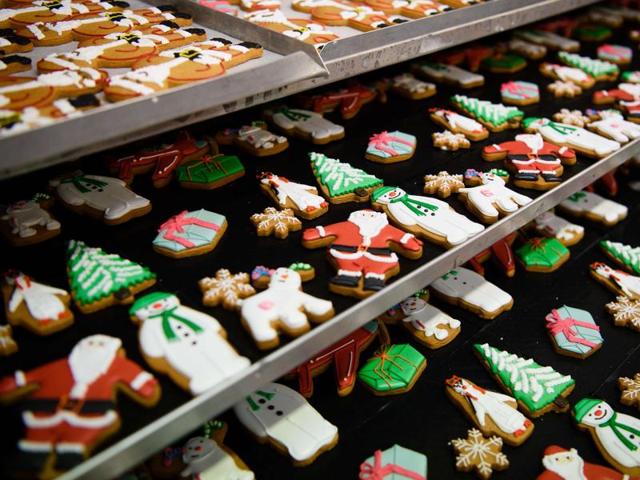 Festive biscuits wait to be packaged at the Biscuiteers biscuit company in south London on December 8, 2015. (AFP) Festive biscuits wait to be packaged at the Biscuiteers biscuit company in south London on December 8, 2015. (AFP)