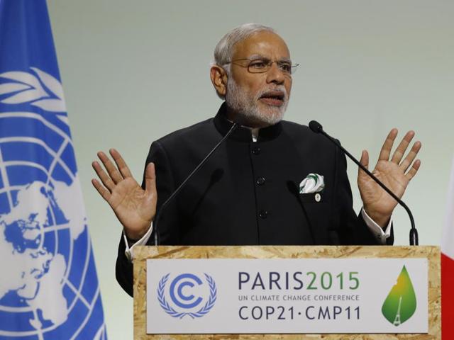 US Secretary of State John Kerry waves as he walks off stage after speaking at the Mashable/UN Foundation "Earth to Paris" Summit in Paris. India has agreed to proposals for a tougher temperature goal, but has opposed a US-backed plan to measure climate finance. (REUTERS Photo) US Secretary of State John Kerry waves as he walks off stage after speaking at the Mashable/UN Foundation "Earth to Paris" Summit in Paris. India has agreed to proposals for a tougher temperature goal, but has opposed a US-backed plan to measure climate finance. (REUTERS Photo)