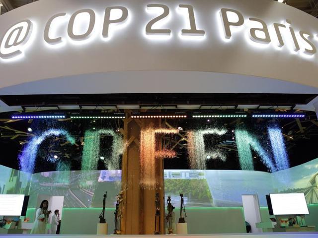 A woman takes a picture of a globe at the COP21, the United Nations Climate Change Conference. (AP Photo) A woman takes a picture of a globe at the COP21, the United Nations Climate Change Conference. (AP Photo)