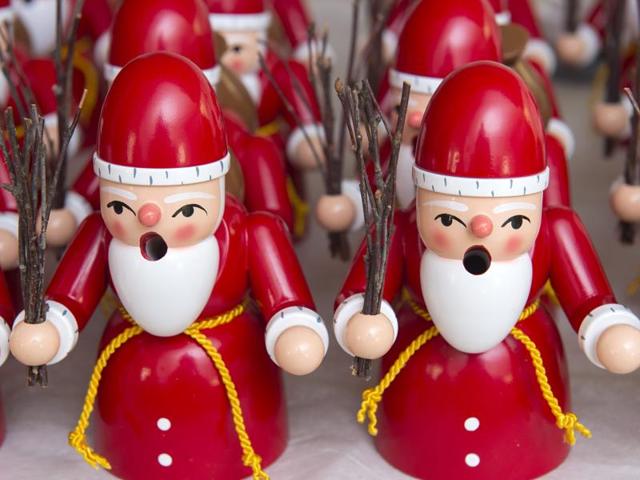 Traditional wooden incense smoker Santa Claus figures, so-called 'Raeuchermann', are displayed at a company in the Erzgebirge mountain region in Gahlenz, eastern Germany, Monday, December 7, 2015. (AP) Traditional wooden incense smoker Santa Claus figures, so-called 'Raeuchermann', are displayed at a company in the Erzgebirge mountain region in Gahlenz, eastern Germany, Monday, December 7, 2015. (AP)
