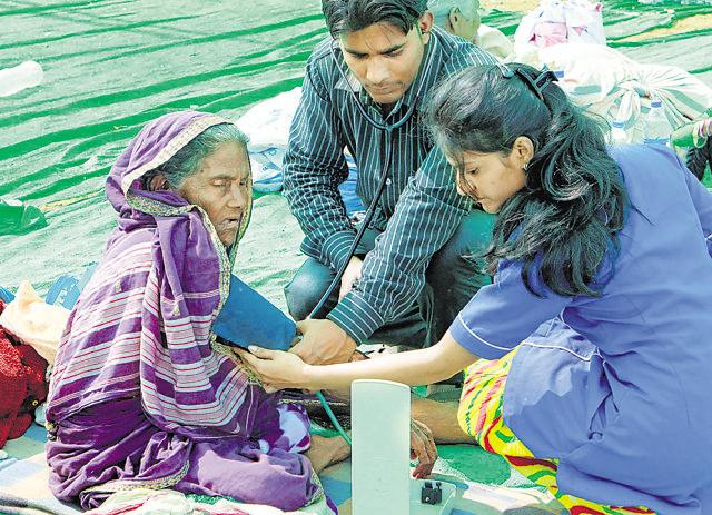 A slum dweller at a medical camp at Damu Nagar slums in Kandivli on Tuesday. (Pratham Gokhale/HT)