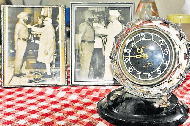 Old photographs of late brigadier Sant Singh, MVC, decorated at his residence in Chandigarh on Wednesday. (HT Photo)