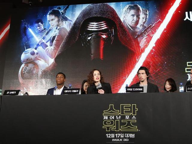 John Boyega, Daisy Ridley and Adam Driver, the stars of Star Wars: The Force Awakens at a Korean press conference for their new movie Star Wars: The Force Awakens. (AP)