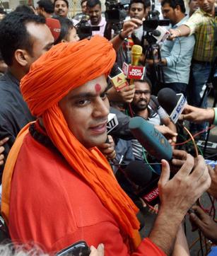 President of Hindu Mahasabha Swami Chakrapani comes out after bidding for one of the assets of underworld don Dawood Ibrahim during an auction in Mumbai on Wednesday. (PTI) President of Hindu Mahasabha Swami Chakrapani comes out after bidding for one of the assets of underworld don Dawood Ibrahim during an auction in Mumbai on Wednesday. (PTI)