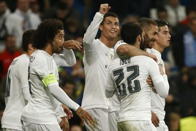 Real Madrid's Cristiano Ronaldo celebrates with team mates after scoring the sixth goal. (Reuters Photo) Real Madrid's Cristiano Ronaldo celebrates with team mates after scoring the sixth goal. (Reuters Photo)
