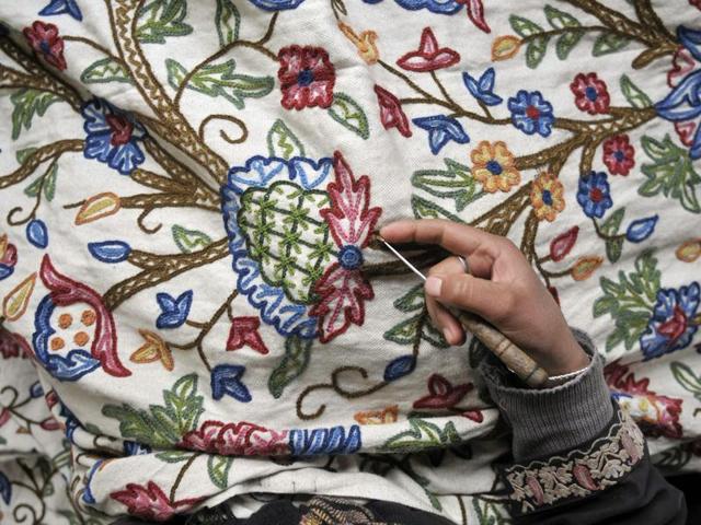 A close look at the embroidery done on window curtains, by Kashmiri women who get a meagre monthly stipend of Rs 700 for the work. (Waseem Andrabi/ HT Photo)