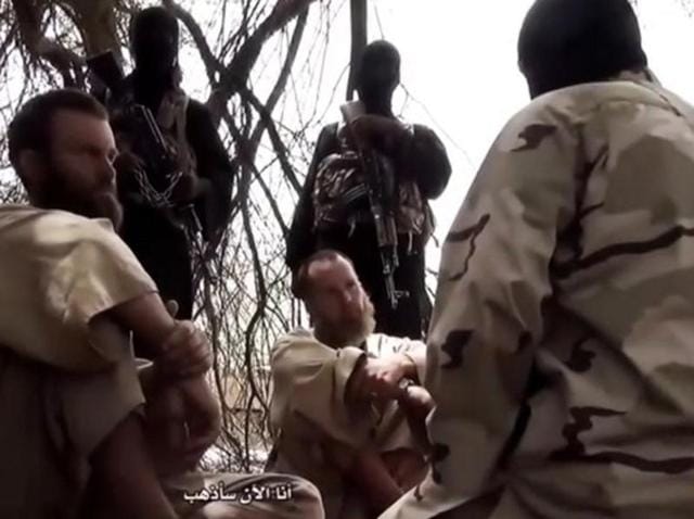 An image grab taken from an undated video released by Al-Andalus Media Production/Shara Branch, a media branch for al-Qaeda in the Islamic Maghreb (AQIM), on June 21, 2015, allegedly shows hostages Johan Gustafson (L) of Sweden and Stephan McGowan of South Africa, who were kidnapped in Mali's northern city of Timbuktu in 2011. (AFP / Al-Andalus / HO) An image grab taken from an undated video released by Al-Andalus Media Production/Shara Branch, a media branch for al-Qaeda in the Islamic Maghreb (AQIM), on June 21, 2015, allegedly shows hostages Johan Gustafson (L) of Sweden and Stephan McGowan of South Africa, who were kidnapped in Mali's northern city of Timbuktu in 2011. (AFP / Al-Andalus / HO)